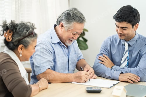Preview: Asian couple senior elder making health insurance contract on table with agency visit at home.