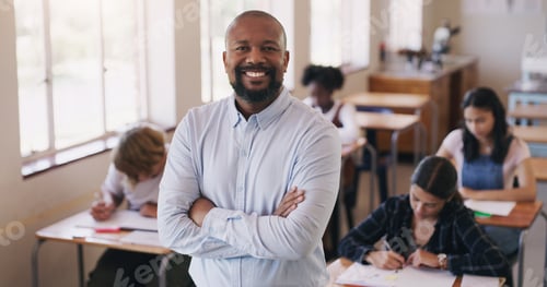 Preview: Welcome to our world of learning. Portrait of mature man teaching a class of teenage students.