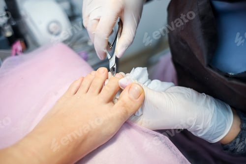 Preview: The girl master of nail service works with the client