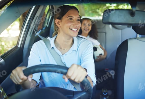 Preview: Cropped shot of an attractive young woman driving a car with her daughter in the backseat