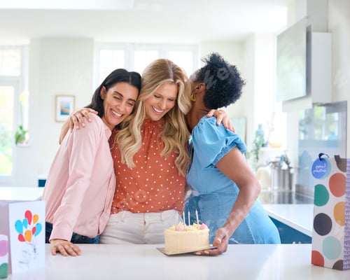 Preview: Three Mature Women Meeting At Home To Celebrate Friend's Birthday With Surprise Cake Together