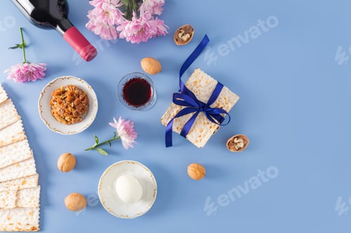 Preview: festive background of the Jewish Passover. traditional symbols and products of the holiday on a blue