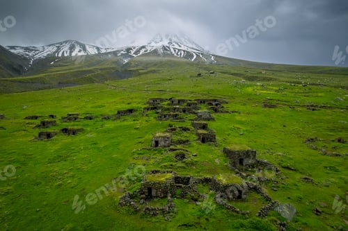 Preview: Mount Hasan view during spring, green grass and snowy peaks, stratovolcano in central anatolia