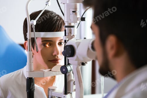 Preview: optometrist checking patient eyesight and vision correction