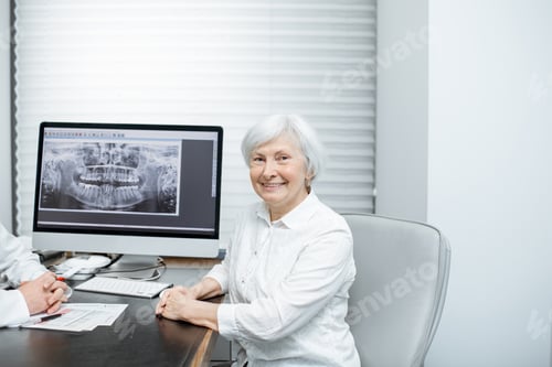 Preview: Senior woman with doctor in the office
