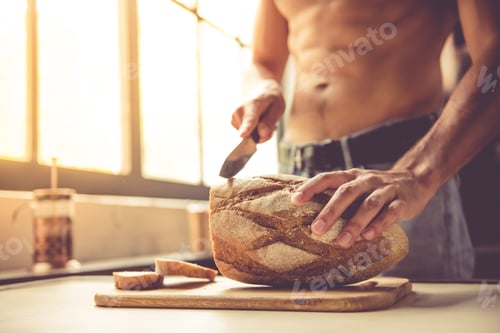 Preview: Sexy young man in kitchen