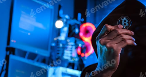 Preview: A male hacker is using a computer to hack data to demand ransom from victims.
