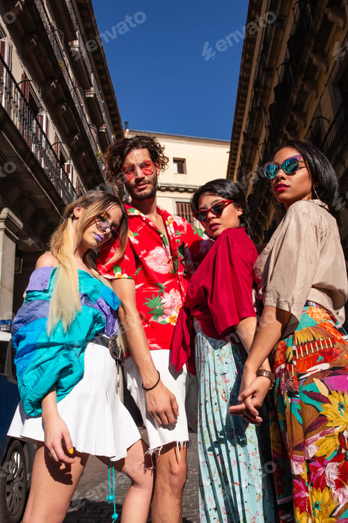 Preview: Stylish friends posing on street