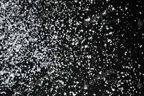 Preview: White snow falling down on black background