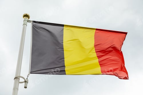Preview: flag of Belgium in the daylight against sky