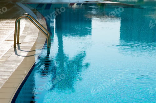 Preview: Surface of blue swimming pool,background of water in swimming pool.