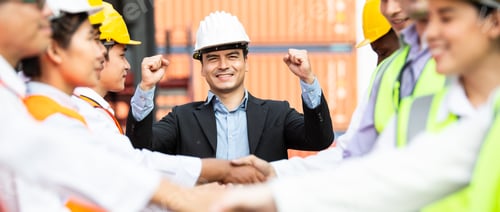 Preview: Group of successful logistic engineer worker hand shaking for business agreement