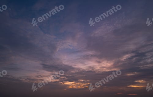 Preview: Sunset sky. Abstract nature background. Dramatic blue and orange, colorful clouds at twilight time.