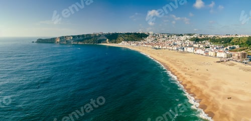 Preview: Aerial drone view of Nazare, Portugal - town, ocean and beach