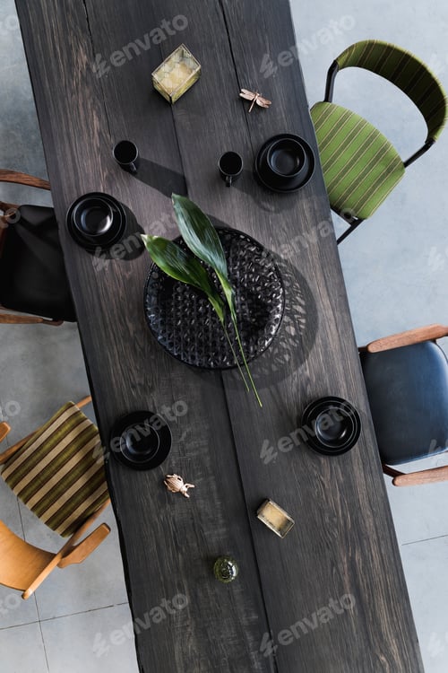 Preview: Elegant rustic wooden dining table. Stylish top view composition of tableware and porcelain.