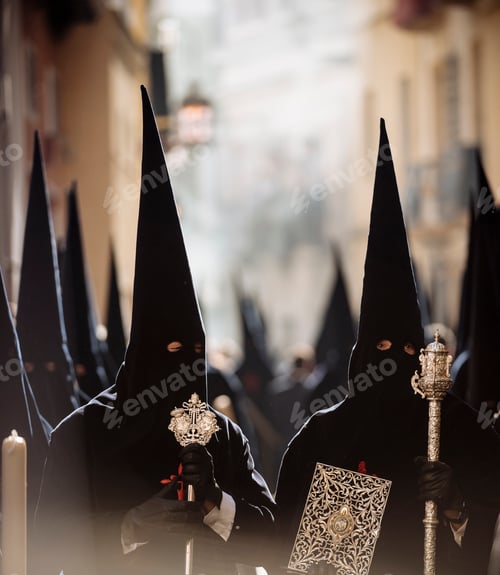Preview: Hooded figures in traditional procession