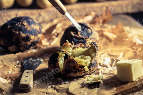 Preview: Closeup of fresh jacket potatoes with butter and salt
