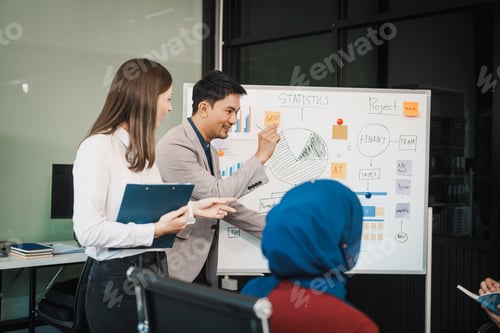 Preview: A diverse team, including a middle-aged Asian businessman, Caucasian young businesswoman