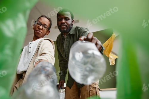 Preview: African American Family Sorting Waste for Recycling