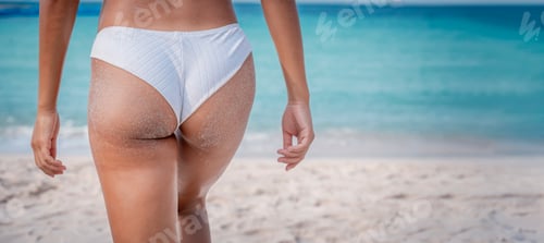 Preview: Sexy bikini woman wearing hat beach posing happiness on tropical beautiful beach having fun playing