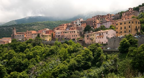 Preview: Beautiful view of historic houses on a hill in Elba, Italy