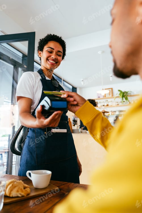 Preview: Barista working in a bar cafeteria