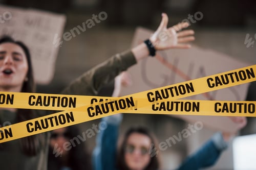 Preview: Blurred motion. Group of feminist women have protest for their rights outdoors