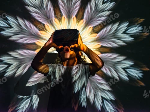 Preview: Anonymous boy in VR glasses under projector picture