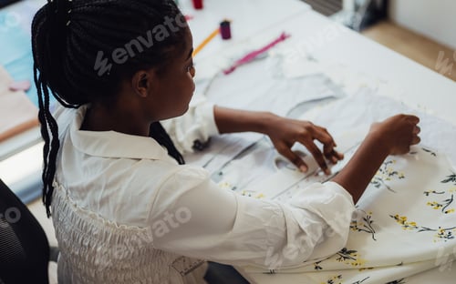 Preview: Profession dressmaker designer working in workshop studio