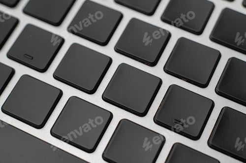 Preview: macro shot of empty blank keys on a keyboard without letter