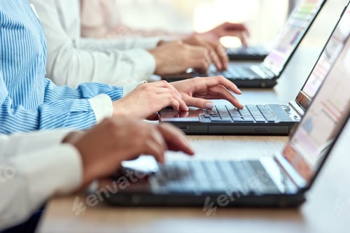 Preview: Female hands typing on laptop.