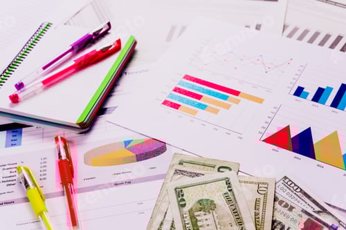 Preview: Financial Charts with US Currency and Colorful Pens