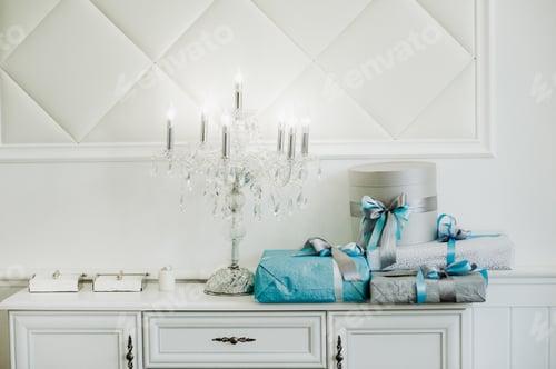 Preview: Gifts in boxes for the guests gathered at the wedding