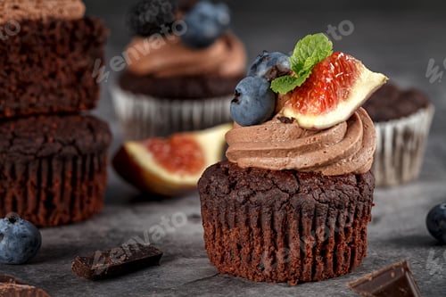 Preview: Delicious Chocolate Cupcakes with Fruit Toppings Displayed