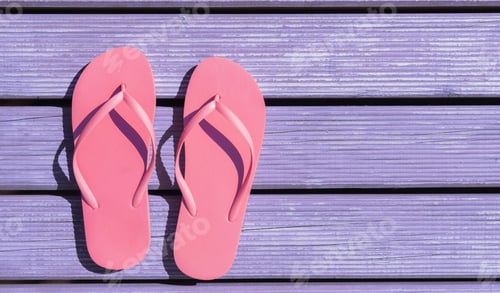 Preview: Pink Flip Flops on Purple Wooden Deck