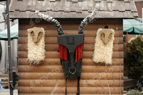 Preview: Stylish modern sheep and goat decorations at holiday market in Lviv. Modern xmas decor for fair