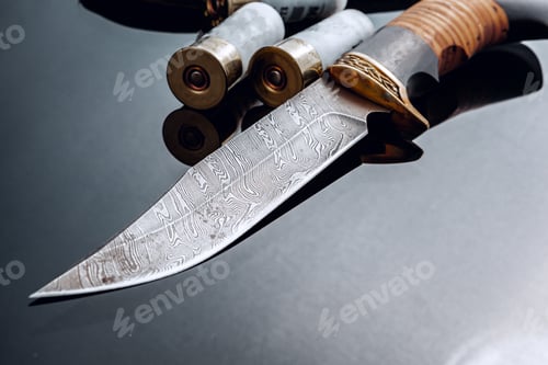 Preview: Hunting knife on black background with reflection