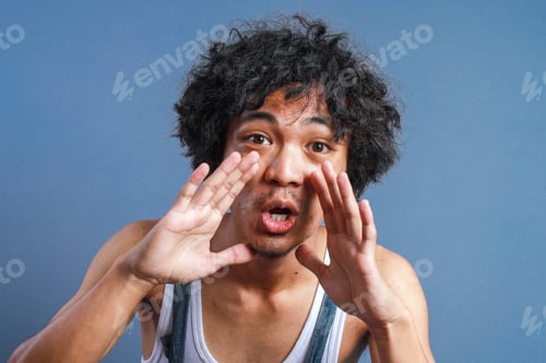 Preview: Man Yelling With Hands Cupped Around Mouth