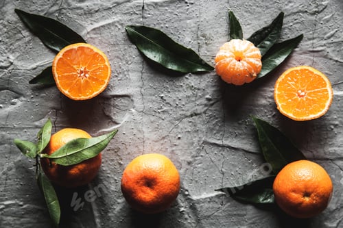 Preview: Citrus on table: mandarin, tangerine with a knife. Fresh organic juicy fruits