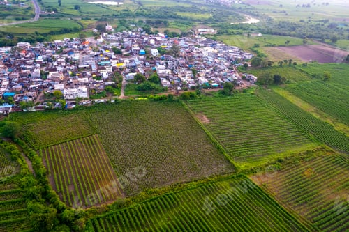 Preview: Aerial view of village and agriculture field, India.