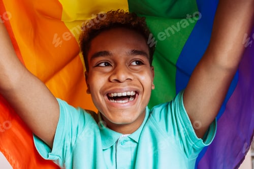 Preview: Homosexual man covered with rainbow flag over his head
