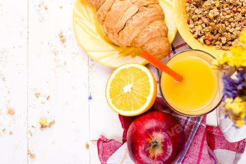 Preview: Healthy Breakfast. Various Assortment Set. Orange Juice, Granola, Croissant, and Fruit.