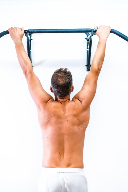 Preview: Muscles of the patient doing a dominated without a shirt