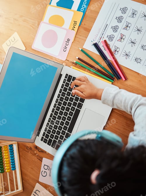 Preview: Computer, girl and online learning at table in home for class, homework and development, growth and