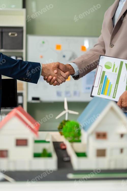 Preview: Businessmen shake hands after agreeing to start a new project successfully,