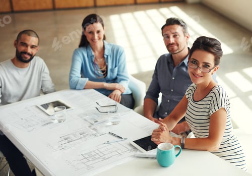 Preview: Shot of a group of coworkers having a meeting in an open plan office