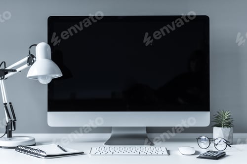 Preview: working place with computer, table lamp and notebook