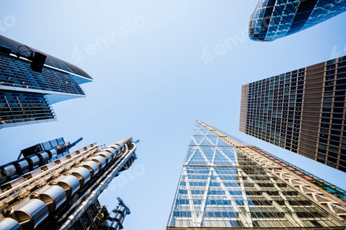 Preview: Low angle view of blue sky from122 Leadenhall St, The Shard and Gherkin, London, UK