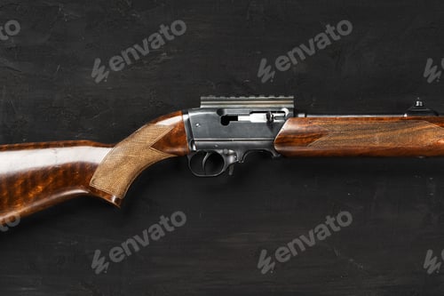 Preview: Smoothbore hunting gun on black background close up