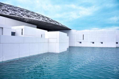 Preview: Stunning aerial view of a world-renowned Louvre Louvremuseum in Abu Dhabi, United Arab Emirates